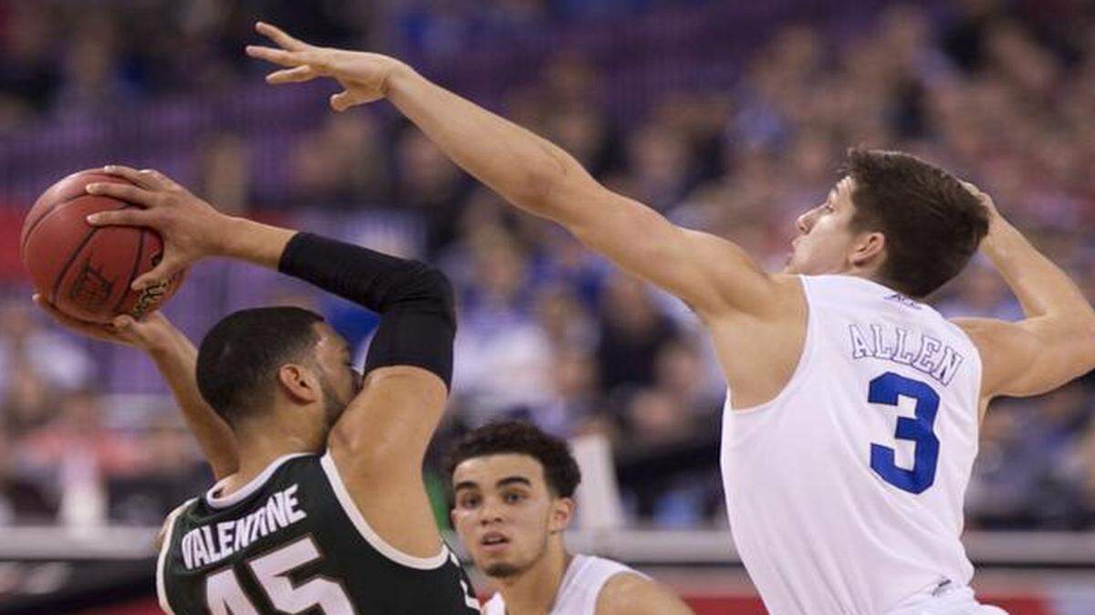 
Duke’s Grayson Allen (3) defends Michigan State’s Denzel Valentine(45) in the first half during the NCAA semifinals onat the Lucas Oil Stadium in Indianapolis.
