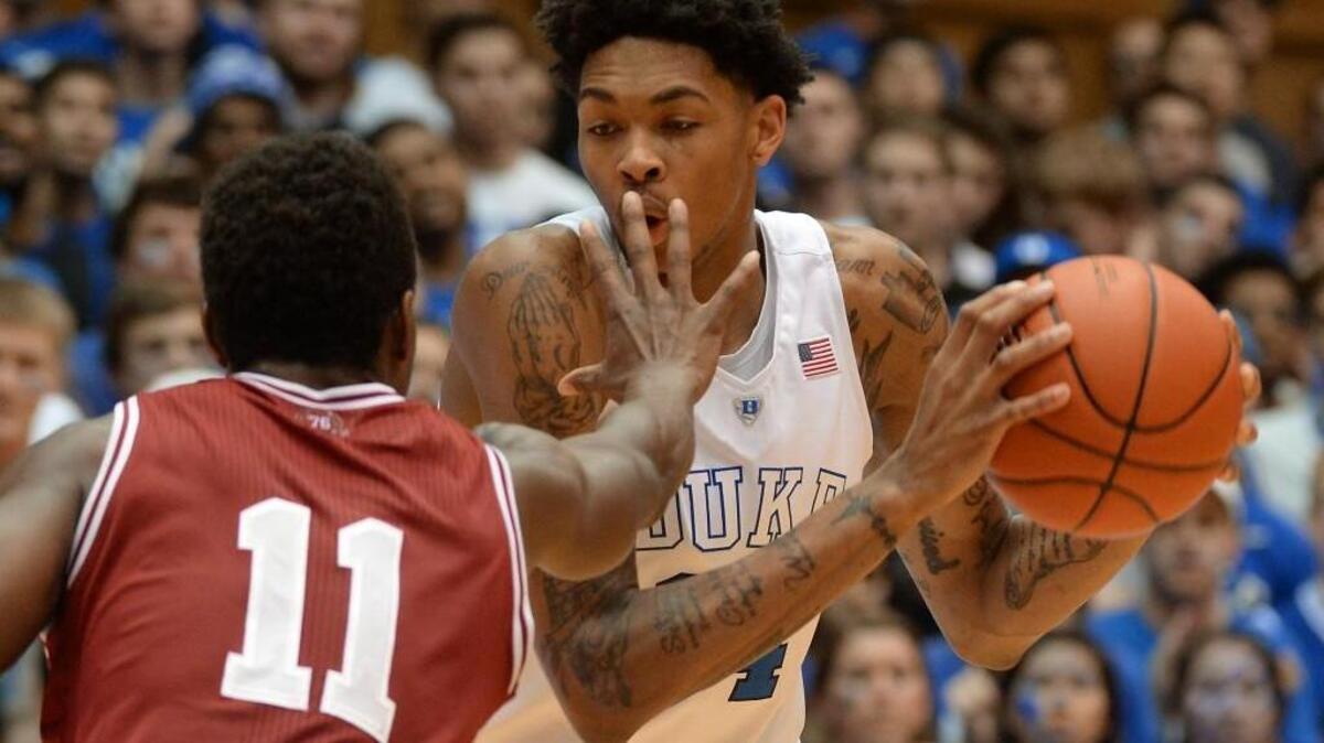 Duke guard Brandon Ingram looks to move around Indiana guard Yogi Ferrell as the Blue Devils beat the Hoosiers 94-74 on Dec. 2. Ingram led Duke with career-high 24 points.