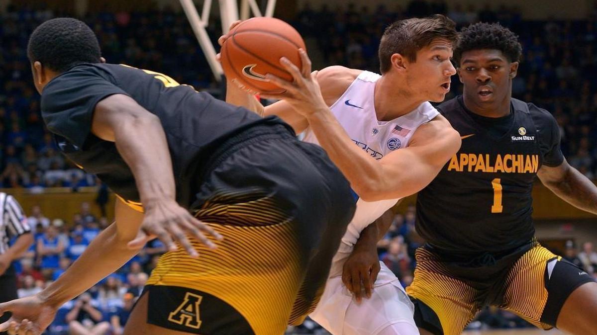Duke’s Grayson Allen drives against App State’s Kelvin Robinson (1) during the game at Cameron Indoor Stadium.