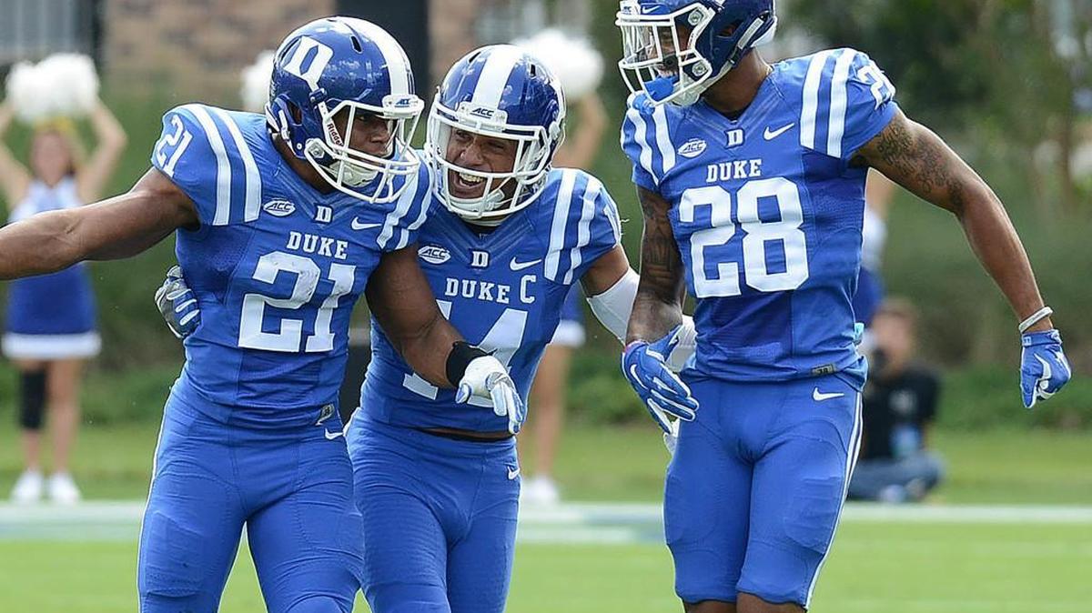 Duke defensive backs Alonzo Saxton II, left, Bryon Fields Jr., middle, and Mark Gilbert react during the Blue Devils win over Northwestern.