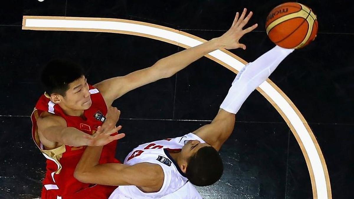
DUBAI, UNITED ARAB EMIRATES - AUGUST 14: Jayson Tatum of the United States shoots against Hao Fu of China during the FIBA U17 World Championships Quarter-Final match between China and the United States of America at the Hamdan Sports Complex on August 14, 2014 in Dubai, United Arab Emirates. (Photo by Francois Nel/Getty Images)
