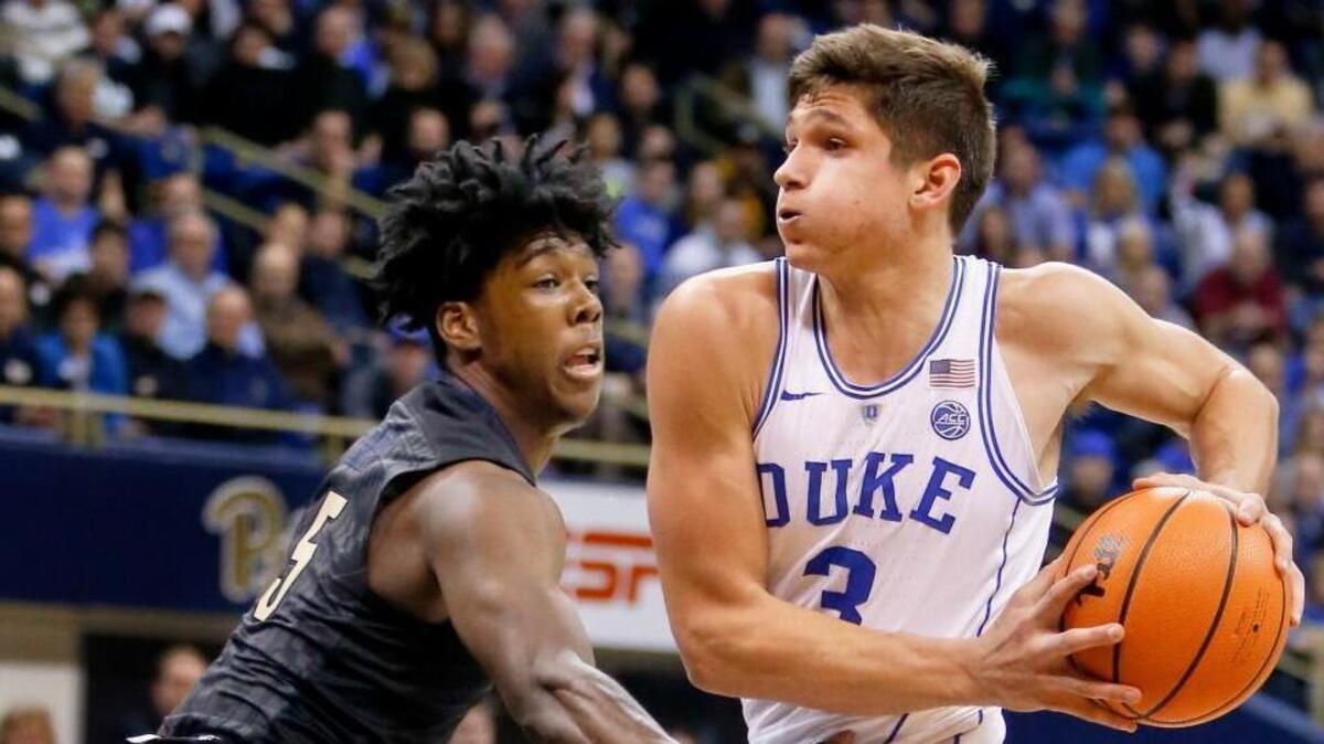 Duke's Grayson Allen (3) drives to the basket as Pittsburgh's Marcus Carr defends during the first half.