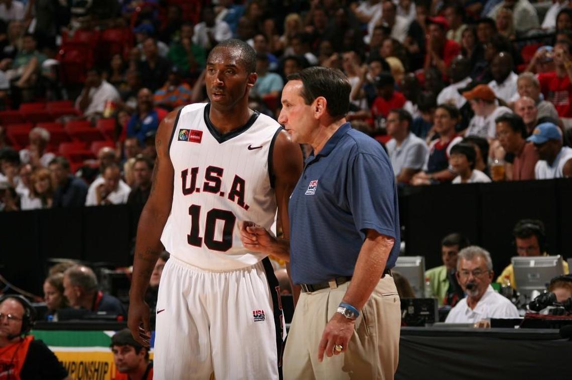 Mike Krzyzewski, right, and Kobe Bryant speak during the USA Men’s Senior National Team’s game against Argentina on Aug. 27, 2007.