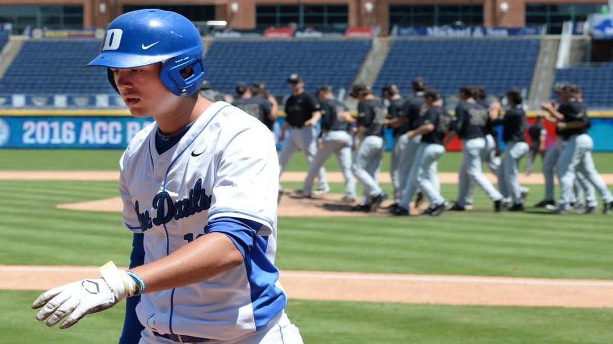 Duke's Michael Smiciklas walks off the field as the Wake Forest Demon Deacons win 4-3 in the opening game of the ACC Baseball Championship at the Durham Bulls Athletic Park in Durham, N.C. Tuesday, May 24, 2016. Smiciklas struck out and left the tying run on third base. Duke is eliminated from the tournament and will now wait to see if they make the NCAA baseball tournament.
