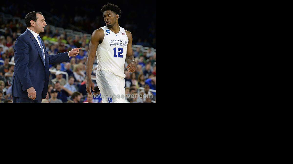 
Duke head coach Mike Krzyzewski directs forward Justise Winslow (12) near game's end as Winslow scored 21 points. 

