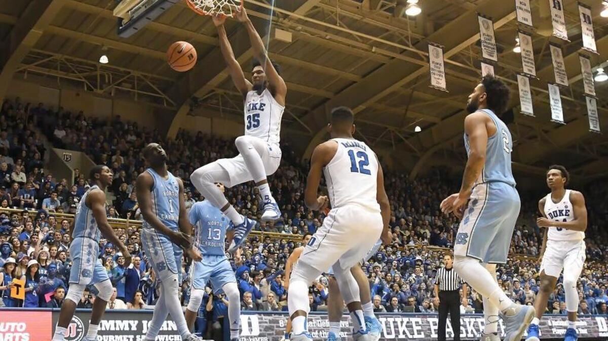 Duke's Marvin Bagley III (35) scores with a second half dunk. Bagley led the Blue Devils with 21 points. Duke defeated UNC 74-64 at Cameron Indoor Stadium In Durham, N.C. Saturday, March 3, 2018.