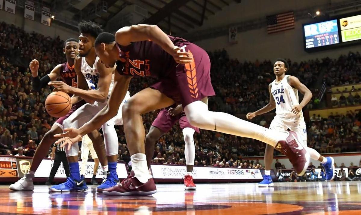Duke forward Marvin Bagley III (35) loses the ball as he's double teamed by Virginia Tech guard Nickeil Alexander-Walker (4) and teammate forward Kerry Blackshear Jr. (24) in the second half.
