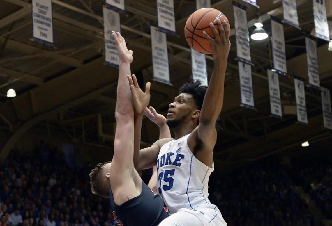 Duke forward Marvin Bagley III (35) shoots over Virginia center Jack Salt (33) in the second half. Bagley scored 30 points as the Blue Devils were defeated by Virginia 65-63 at Cameron Indoor Stadium In Durham on Saturday, Jan. 27, 2018