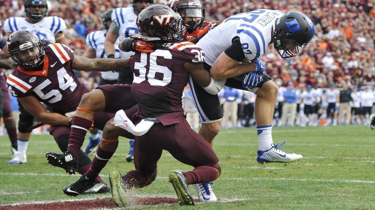 Duke wide receiver Max McCaffrey (87) catches a touchdown pass while being defended by Virginia Tech’s Adonis Alexander (36) in the first half at Lane Stadium in Blacksburg.
