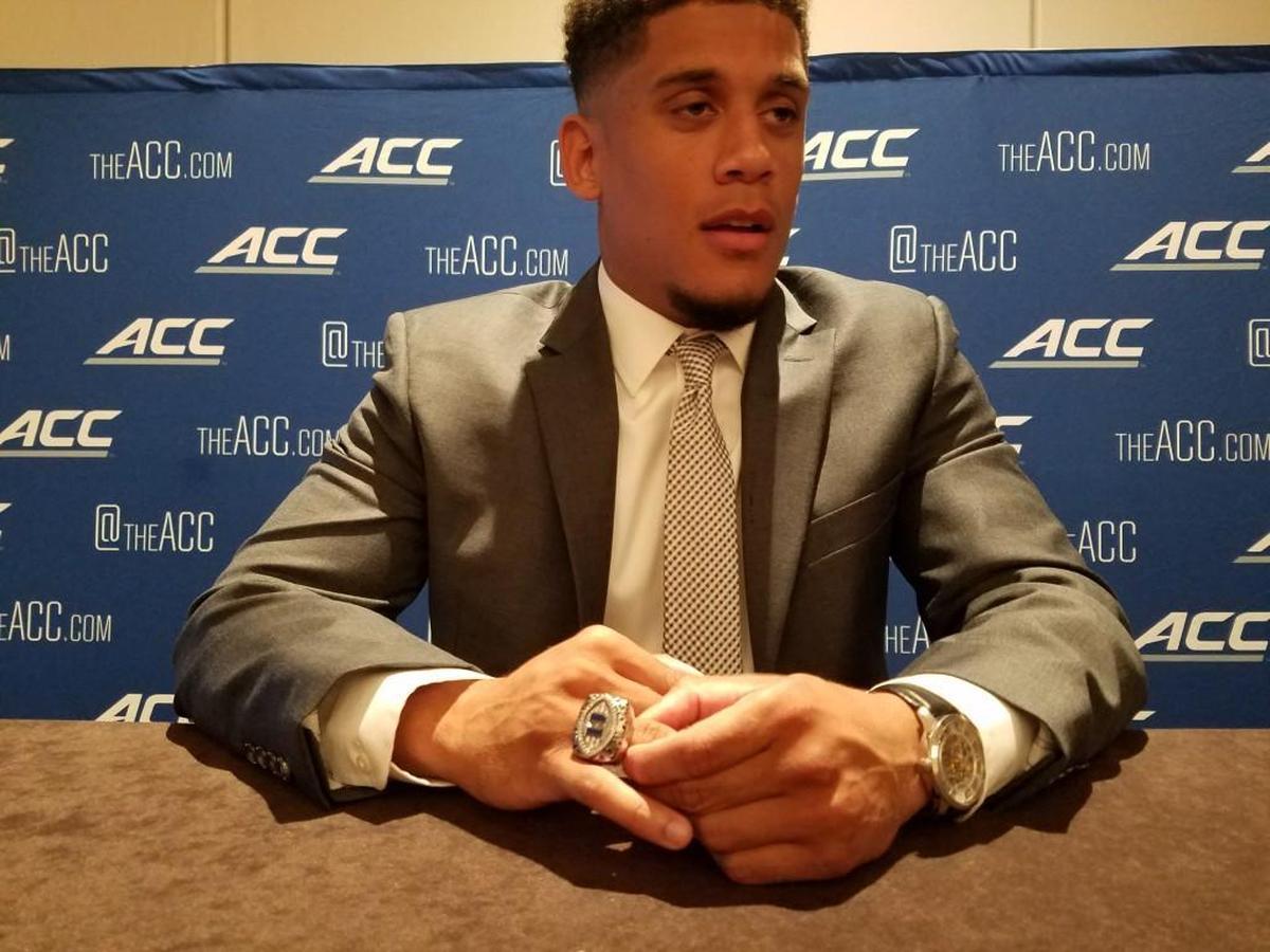 Duke redshirt senior cornerback Bryon Fields, Jr., shows off his 2013 Coastal Division championship ring during the ACC Kickoff media event Friday in Charlotte.