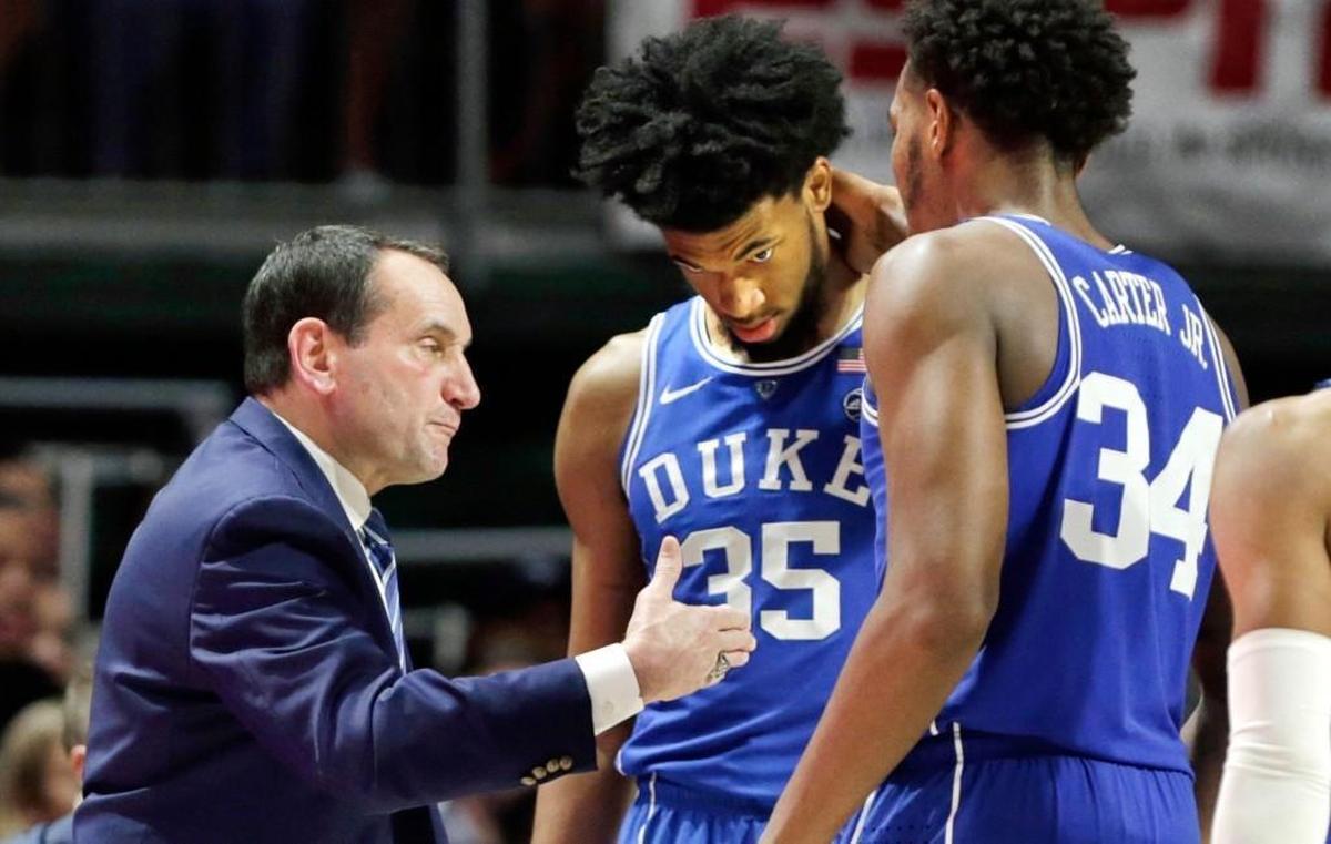 Duke head coach Mike Krzyzewski, left, talks with Marvin Bagley III (35) and Wendell Carter Jr (34) during the second half of Duke’s loss to St. John’s at Madison Square Gardent on Feb. 3, 2018.