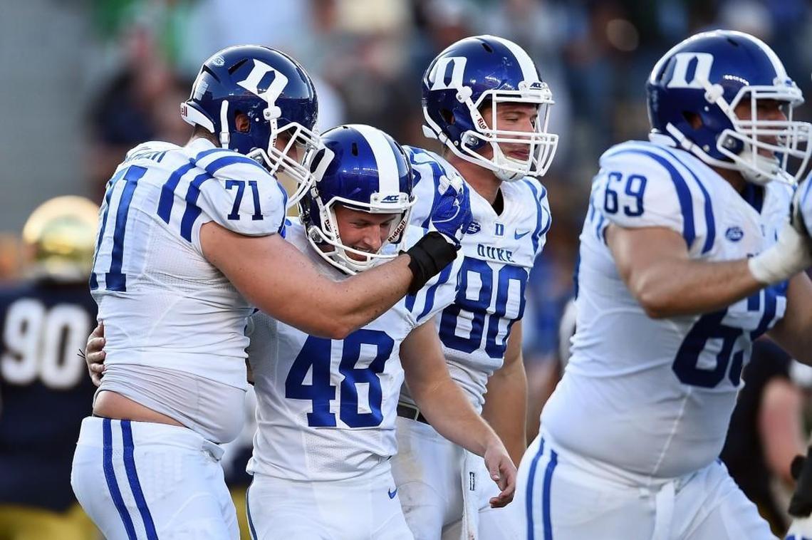 Duke’s AJ Reed (48) is congratulated by teammates after kicking the game-winning field goal against the Notre Dame in September.