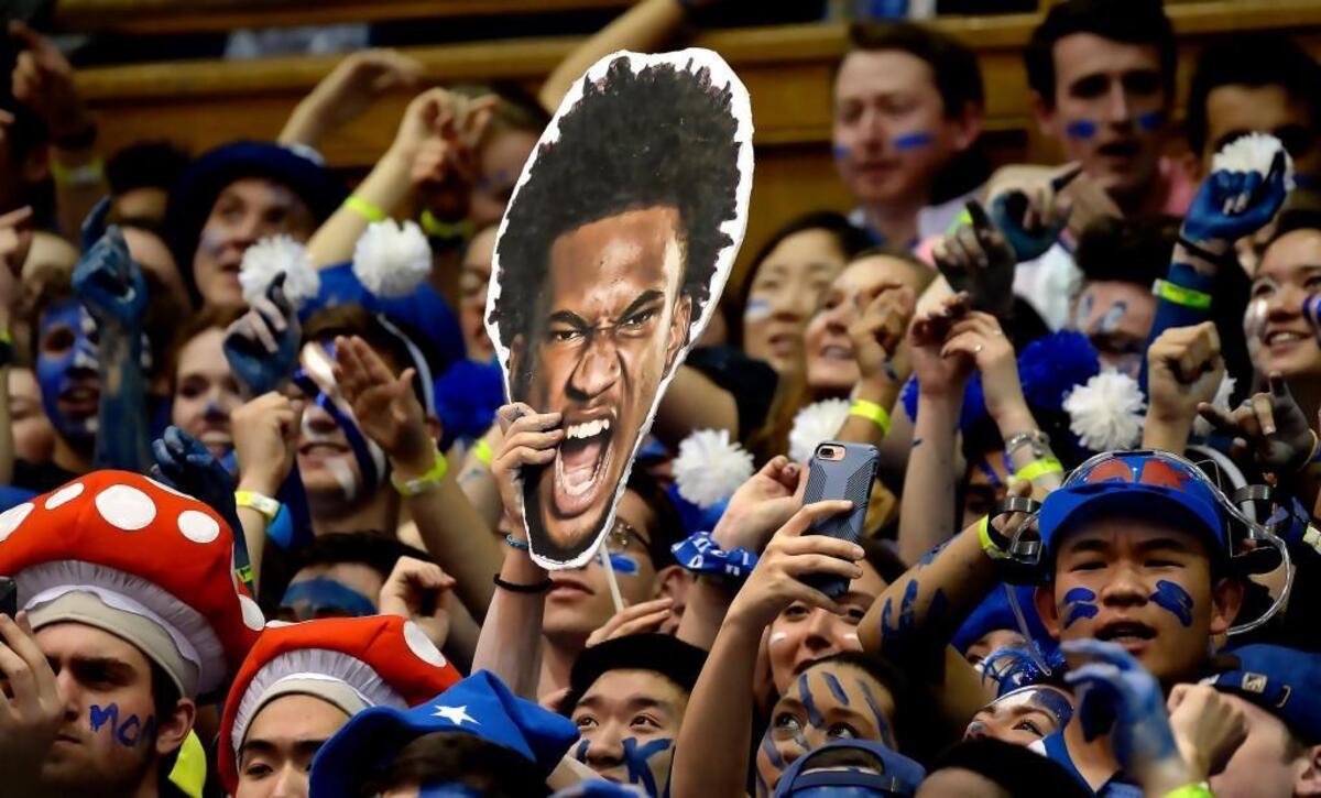 Fans hold up a photo of Duke Marvin Bagley III (35) during the game as Duke defeated UNC 74-64 at Cameron Indoor Stadium In Durham, N.C. Saturday, March 3, 2018.