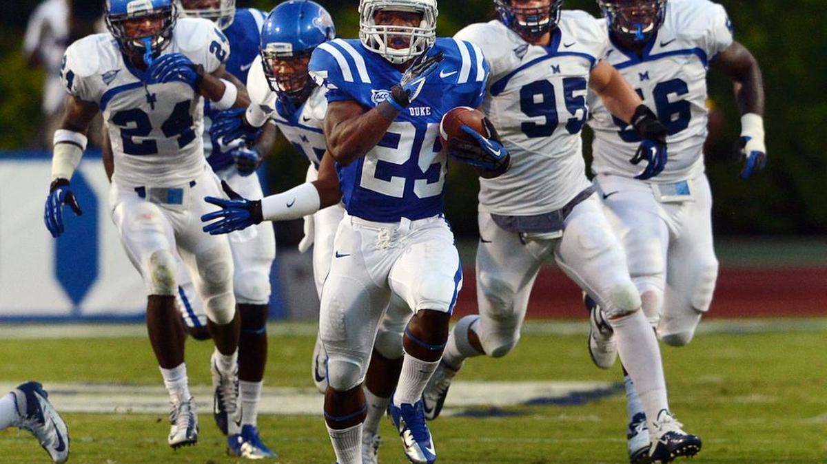
Duke running back Jela Duncan (25) breaks away from the Memphis defense for a long second quarter run at Wallace Wade Stadium in Durham, N.C. Saturday Sept. 22, 2012.
