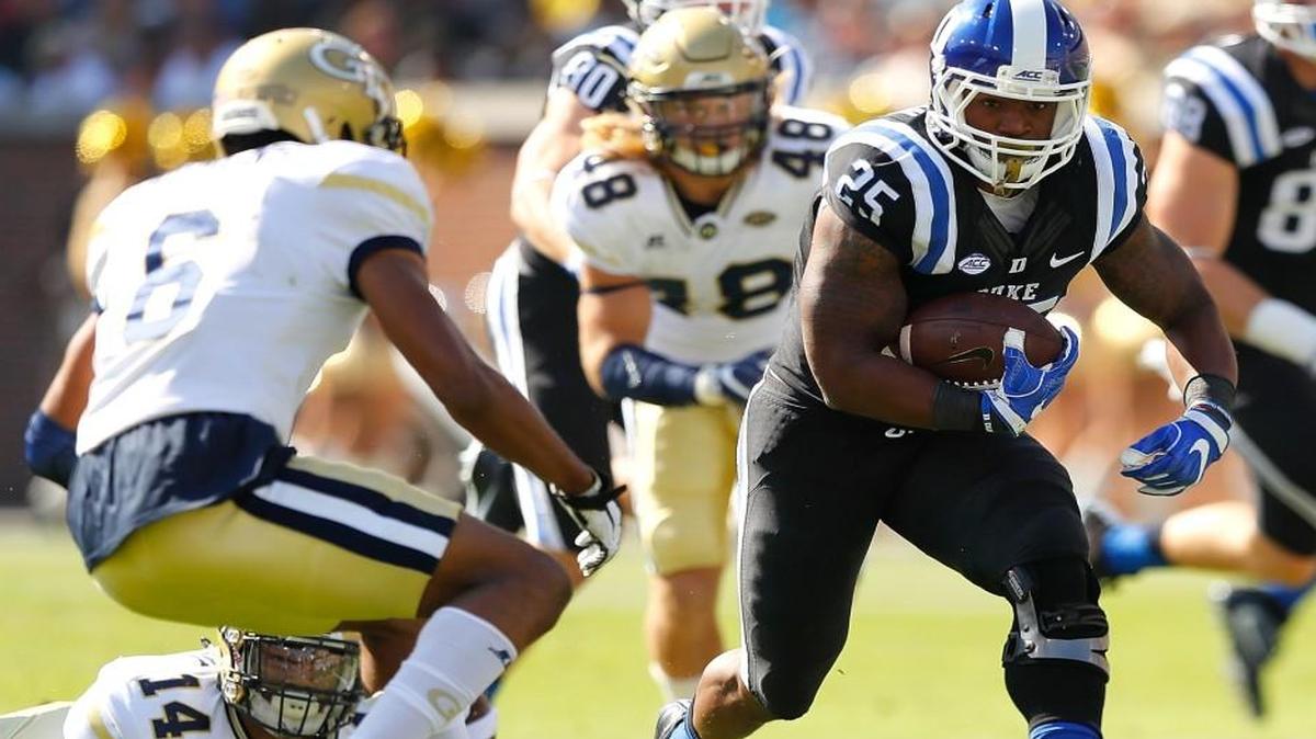 Duke’s Jela Duncan rushes against Georgia Tech’s Lamont Simmons (6) at Bobby Dodd Stadium in Atlanta.