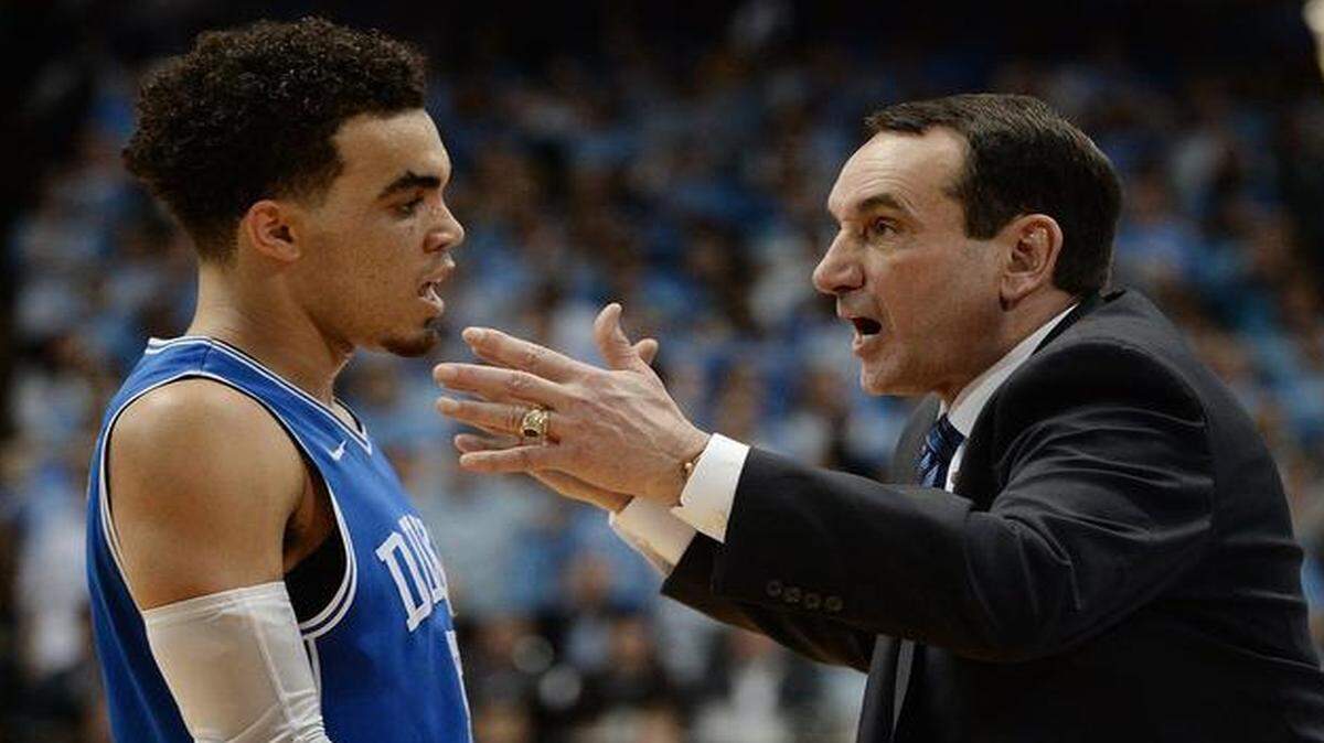 
Duke guard Tyus Jones and coach Mike Krzyzewski talk during the second half against UNC at the Dean Smith Center in Chapel Hill.
