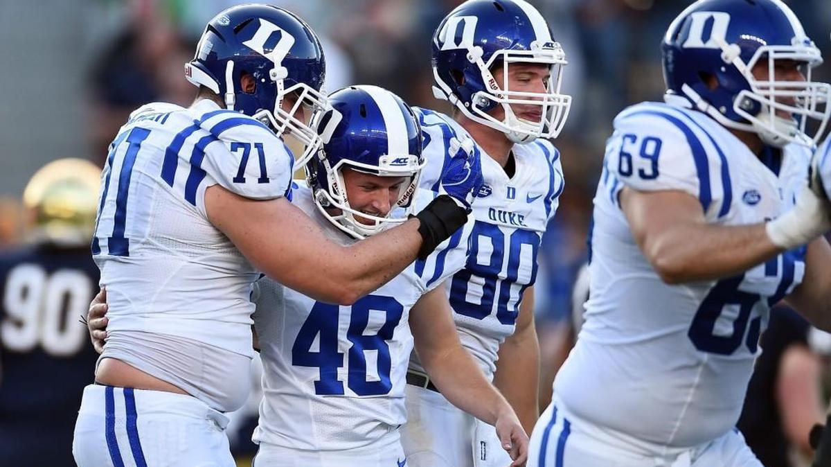 Duke’s AJ Reed (48) is congratulated by teammates after kicking the game-winning field goal against the Notre Dame in September.