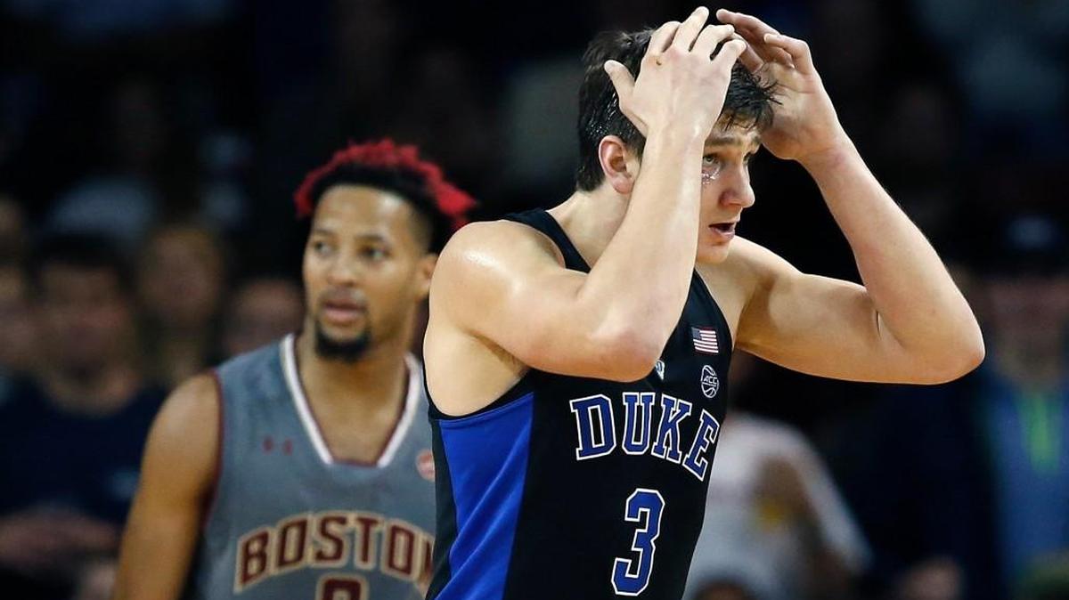 Duke's Grayson Allen (3) reacts in front of Boston College's Ky Bowman (0) after being called for foul during the second half of an NCAA college basketball game in Boston, Saturday, Dec. 9, 2017. Boston College won 89-84.