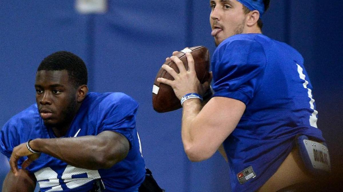 Duke announced Saturday that quarterback Thomas Sirk, right, will not play this season due to an Achilles injury.