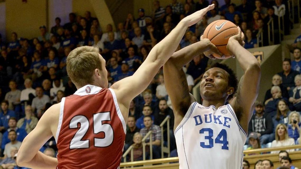 Duke forward Wendell Carter Jr (34) shoots over South Dakota forward Tyler Hagedorn (25) in the first half of play. Duke defeated South Dakota 96-80 at Cameron Indoor Stadium in Durham, N.C. Saturday December 2, 2017.
