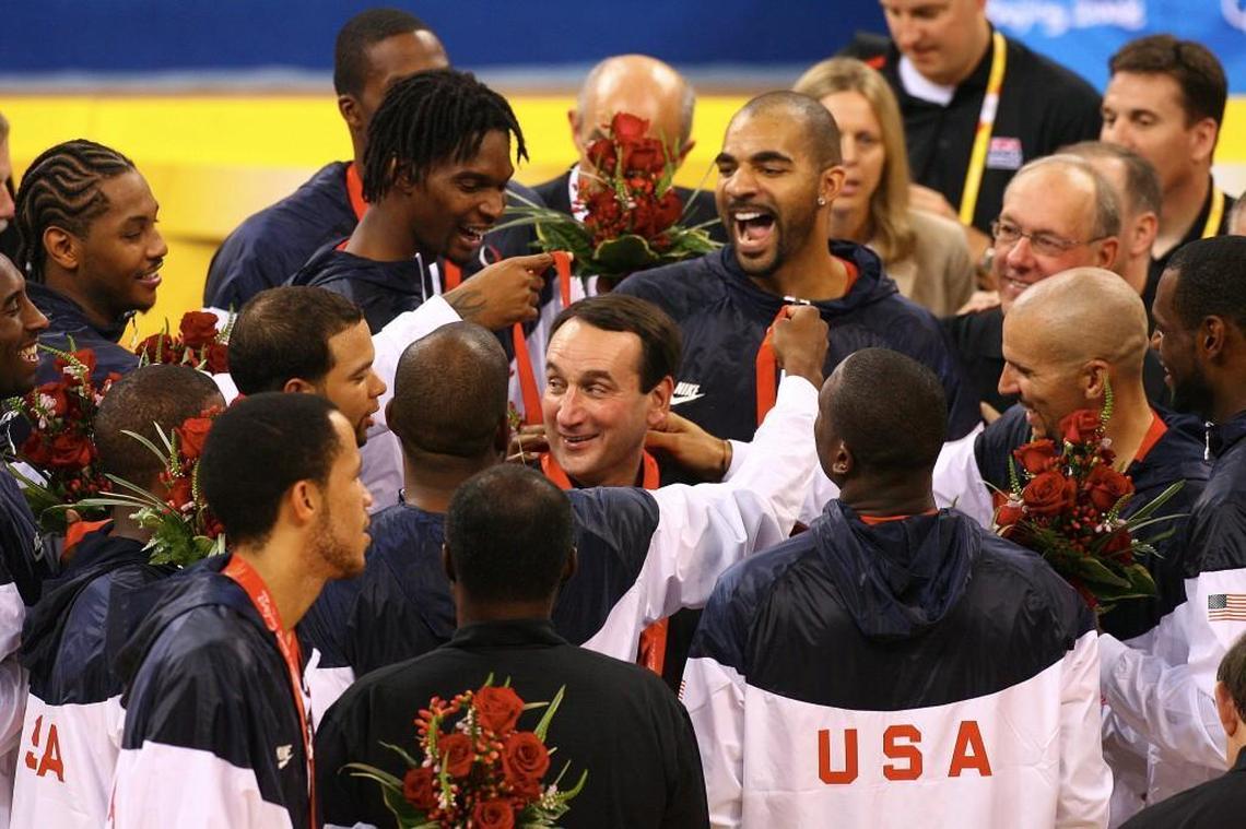 Mike Krzyzewski is surrounded by the U.S. Men’s Senior National Team after winning the men’s gold medal game at the 2008 Beijing Olympic Games.