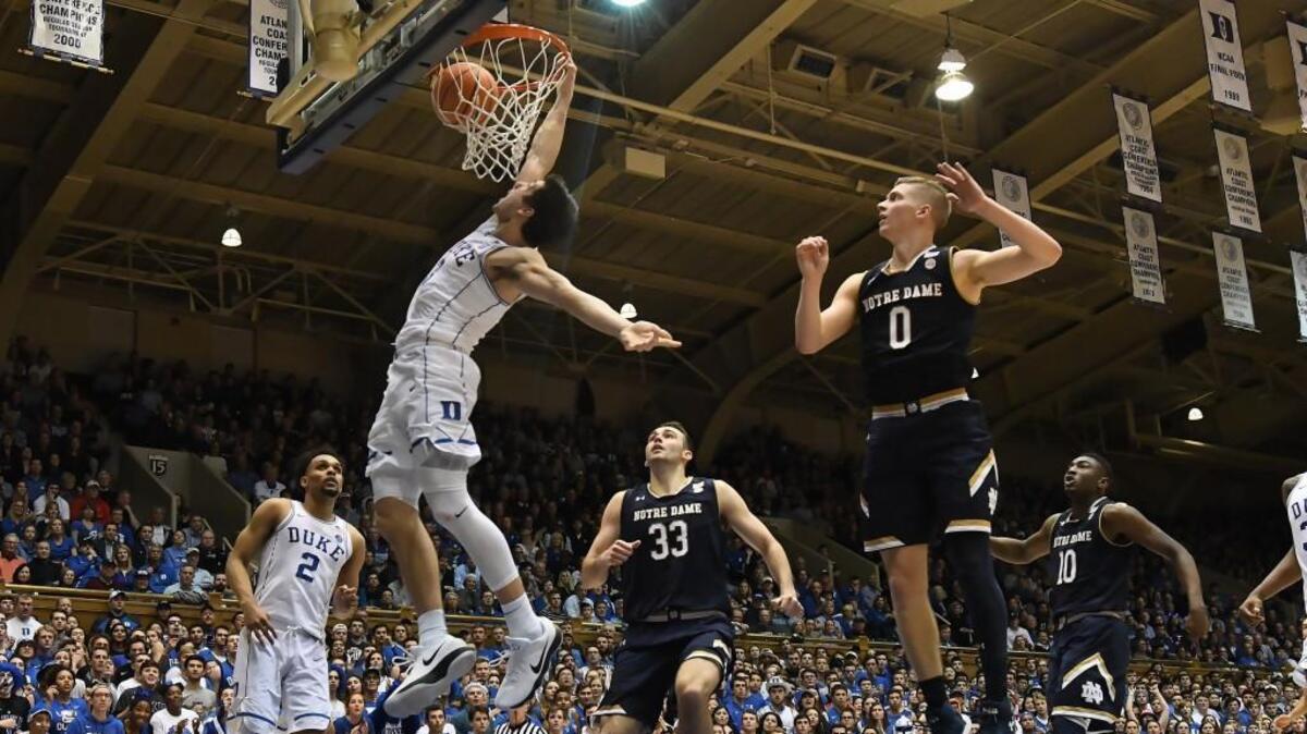 Duke guard Grayson Allen slams a dunk during the Blue Devils’ 88-66 win over Notre Dame on Monday.