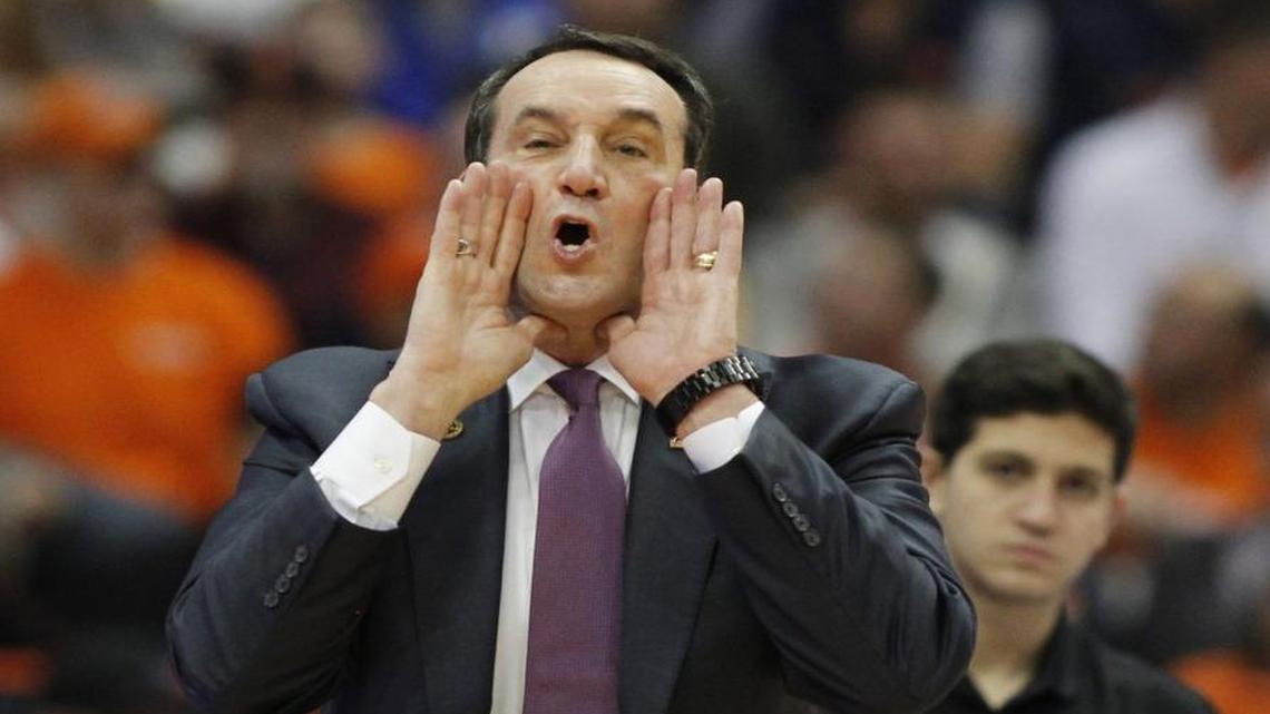 Duke head coach Mike Krzyzewski yells to his players in the second half against Syracuse.