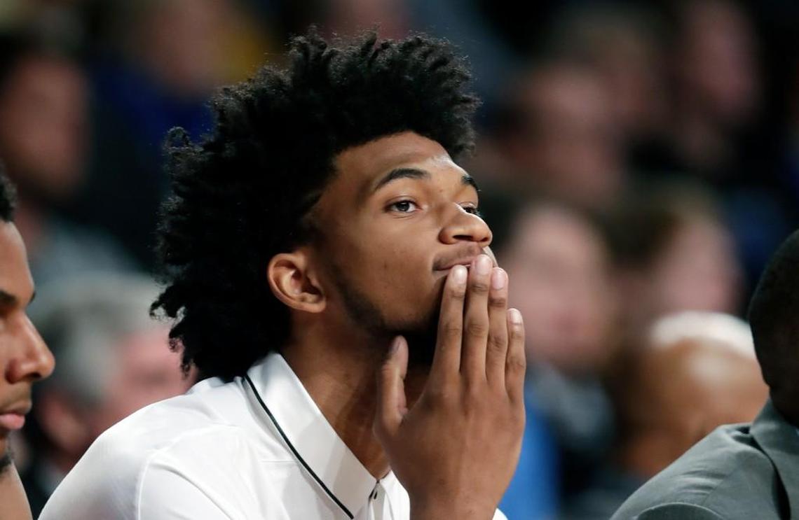 Injured Duke forward Marvin Bagley III sits on the bench in the second of an NCAA college basketball game against Georgia Tech Sunday, Feb. 11, 2018, in Atlanta. Duke won 80-69.