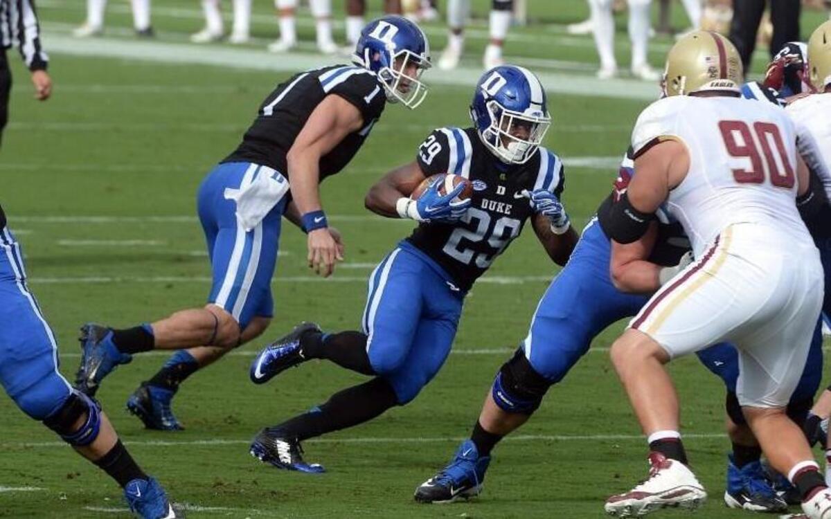 
Duke quarterback Thomas Sirk (1) hands off to running back Shaun Wilson (29) in the first quarter against Boston College.  at Wallace Wade Stadium in Durham.
