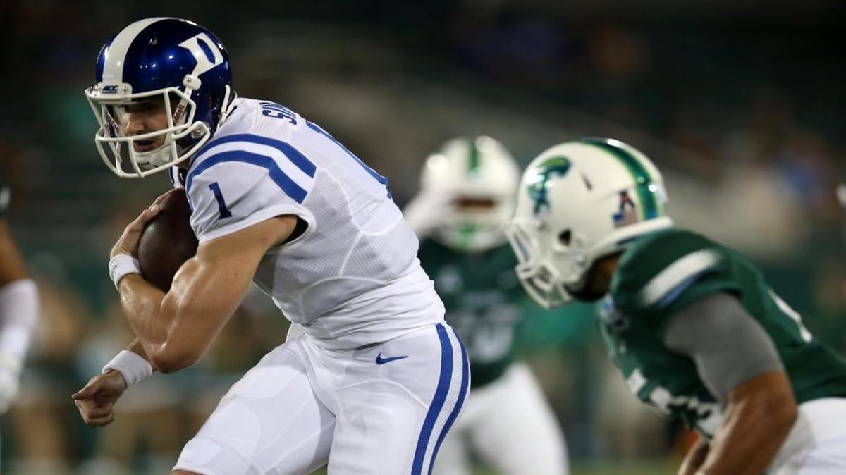 
Thomas Sirk (1) of the Duke Blue Devils runs with the ball against the Tulane Green Wave on Sept. 3 in New Orleans. 
