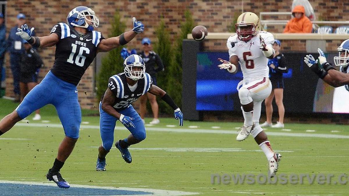 
Duke defenders safety Jeremy Cash (16), safety DeVon Edwards (27) and cornerback Alonzo Saxton II (21) break up a pass to Boston College wide receiver Sherman Alston (6) in the first quarter.
