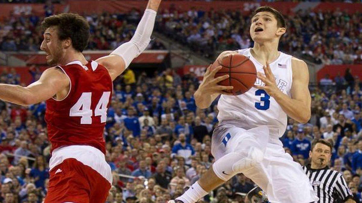 
Dukes Grayson Allen (3) drives to the basket against Wisconsins Frank Kaminsky (44) during the NCAA championship game in Indianapolis.
