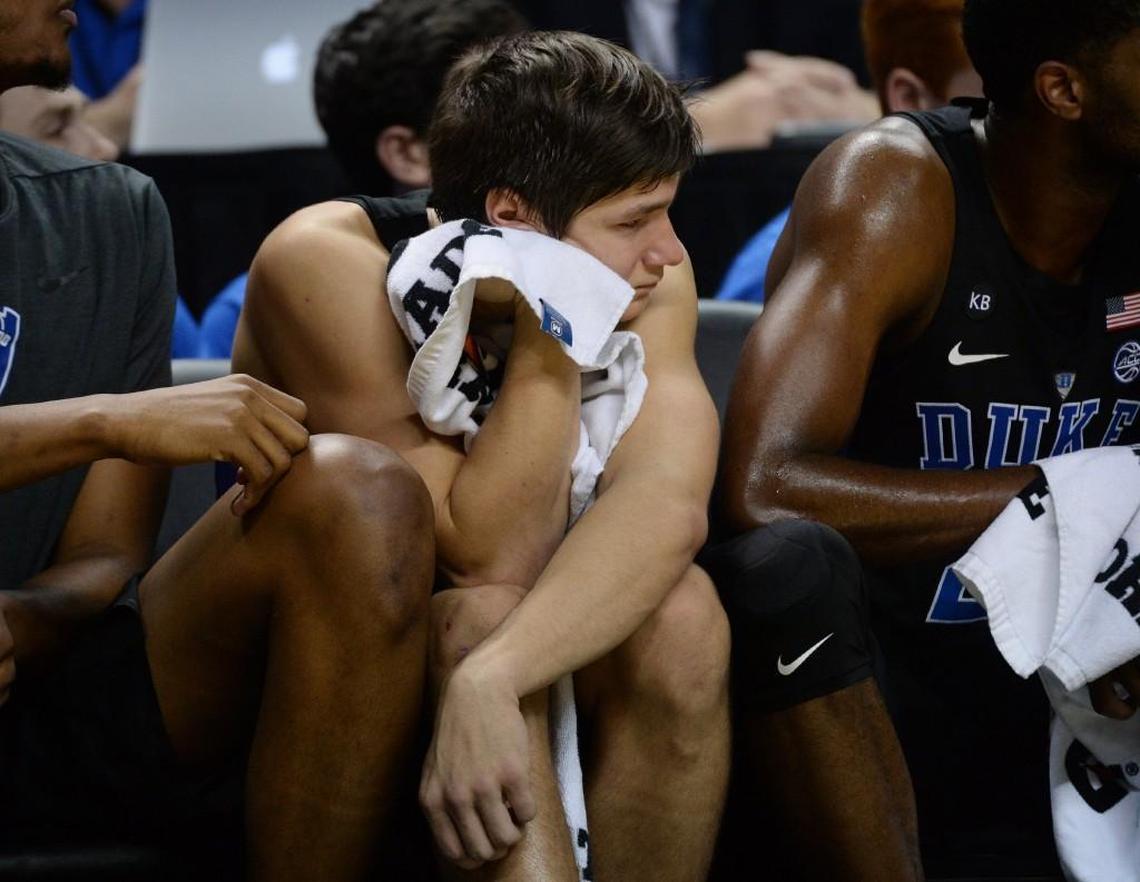 Duke guard Grayson Allen watches the game from the bench in the second half after he tripped Elon player Steven Santa Ana on Dec. 21. Duke beat Elon 72-61.