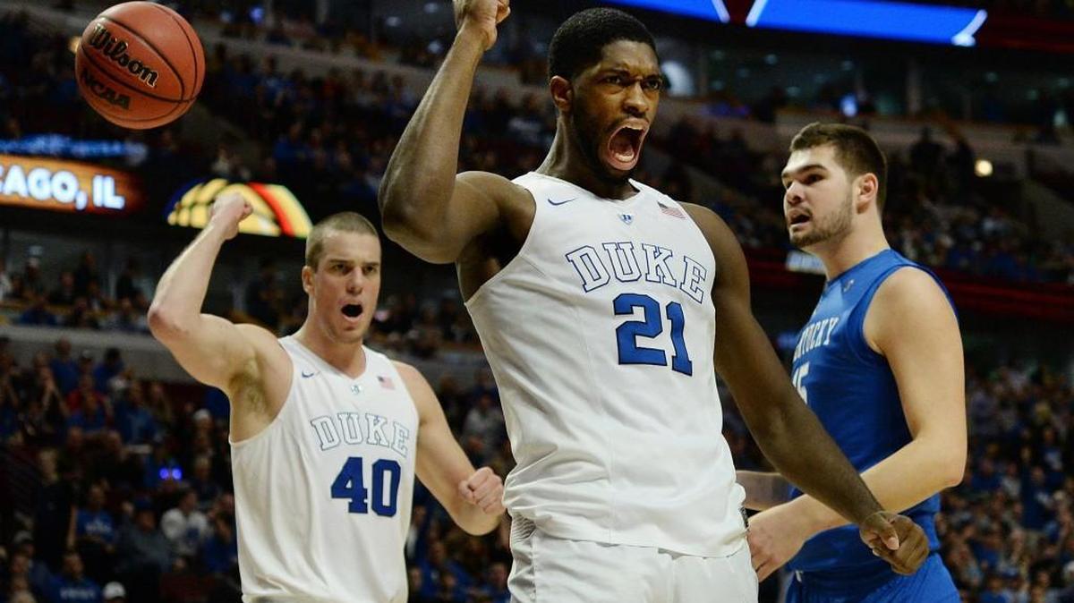 Duke’s Amile Jefferson, middle, and Marshall Plumlee, left, react after a basket as Jefferson is fouled by Kentucky forward Isaac Humphries, right, on Nov. 17. Jefferson is out indefinitely after injuring his right foot.