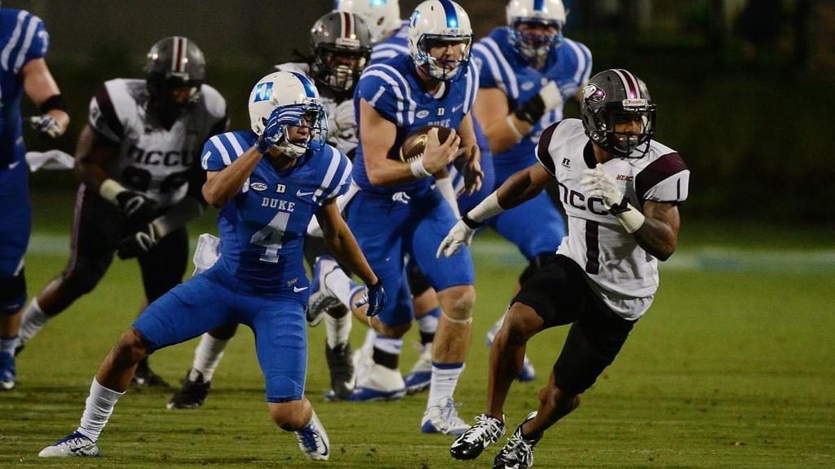 Duke quarterback Thomas Sirk (1) makes a first down against N.C. Central on Sept. 12. Sirk has 18 carries for 109 yards.