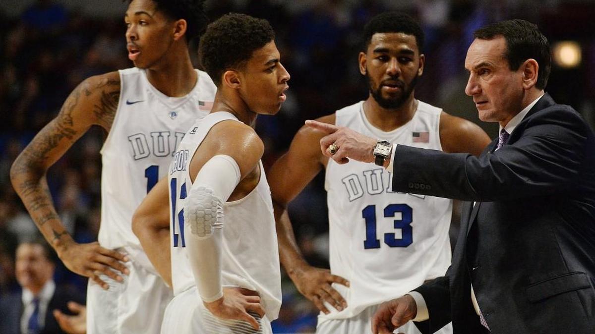 Duke head coach Mike Krzyzewski speaks with guard Derryck Thornton (12) as guards Brandon Ingram (14) and Matt Jones (13) look on. Kentucky beat Duke 74-63 at the United Center in Chicago, Il, Tuesday, November 17, 2015.