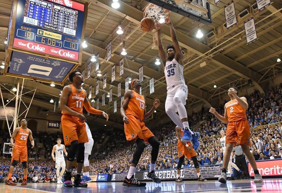 Duke forward Marvin Bagley III (35) returns to action and dunks over the Syracuse defense in the first half. Duke battled Syracuse at Cameron Indoor Stadium In Durham, N.C. Saturday, Feb. 24, 2018.