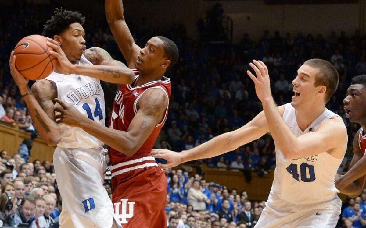 Duke guard Brandon Ingram (14) looks to pass to teammate center Marshall Plumlee (40) as Indiana forward Troy Williams (5) and center Thomas Bryant (31) play defense during their game at Cameron Indoor Stadium, Wednesday, Dec. 2, 2015 in Durham.