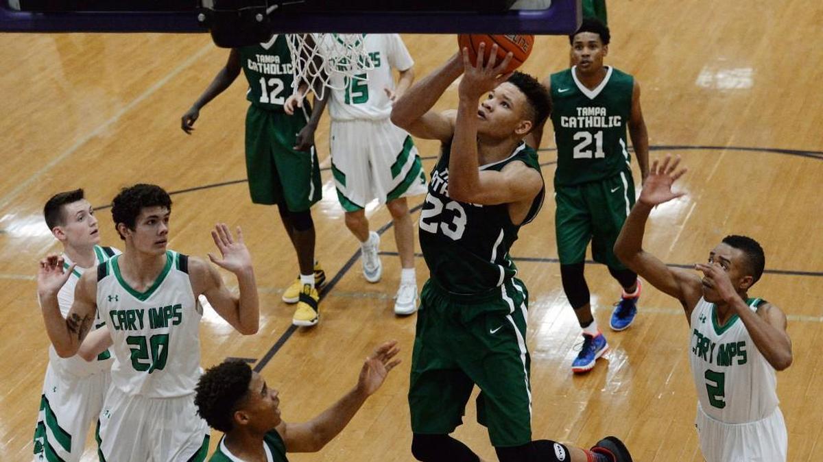 Tampa Catholic’s Kevin Knox fires up a shot over Cary during the John Wall Holiday Invitational in December. Knox is one of four top recruits who have not made their college decision.