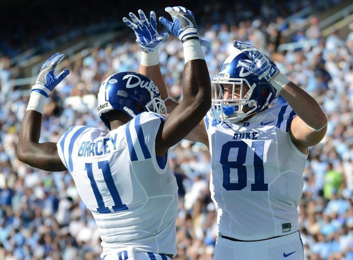 Duke's Davis Koppenhaver (81) celebrates with touchdown with Scott Bracey (11).