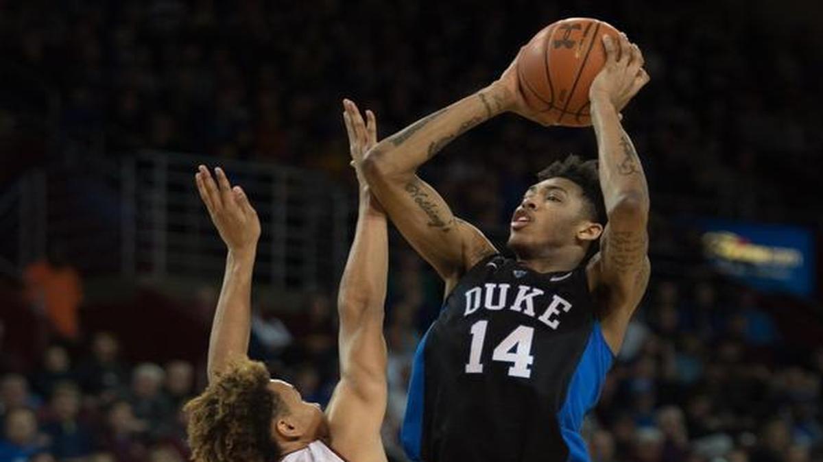 Duke guard Brandon Ingram (14) shoots the ball over the reach of Boston College forward A.J. Turner (11) during the second half in Boston.