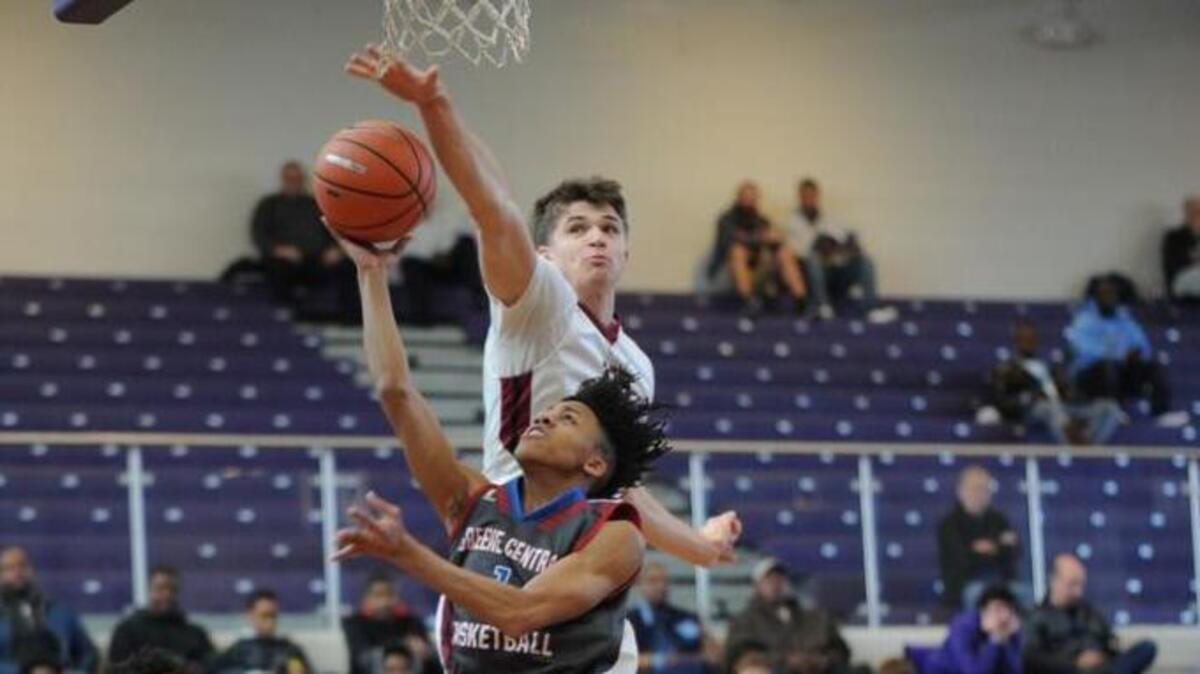 Trinity Christian forward Joey Baker, top middle, left the game against Greene Central early in the first half on Wednesday due to an injury. He returned in the second half to score 13 points in front of his future Duke coaches.