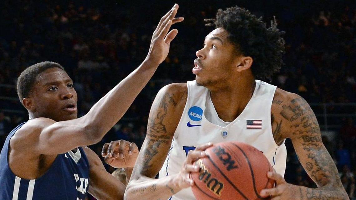 Duke guard Brandon Ingram (14) looks to move against Yale forward Justin Sears (22) in the first half of play. Ingram scored 25 points in the victory. Duke advances to the West Regional after defeating Yale 71-64 at the Dunkin' Donuts Center in Providence, RI. Saturday, March 19, 2016.