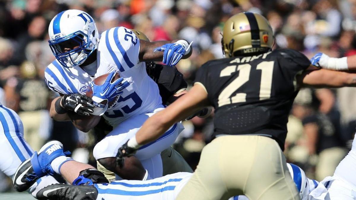 
Duke Blue Devils' Jela Duncan (25) runs the ball against the Army Black Knights. 
