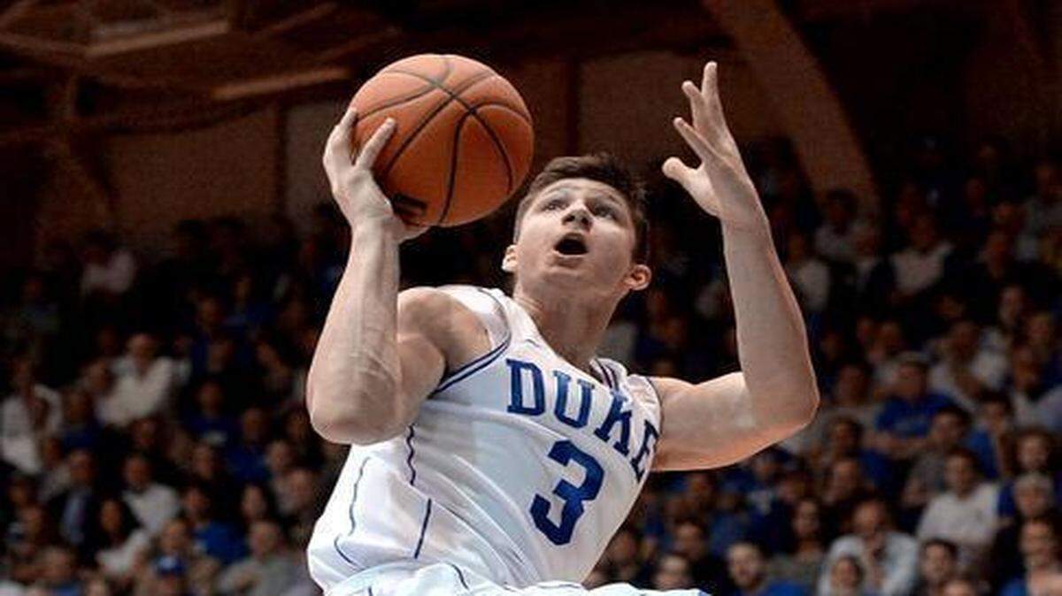 
Duke guard Grayson Allen goes up and over Wake Forest guard Mitchell Wilbekin in the first half to score two of his 19 points. .
