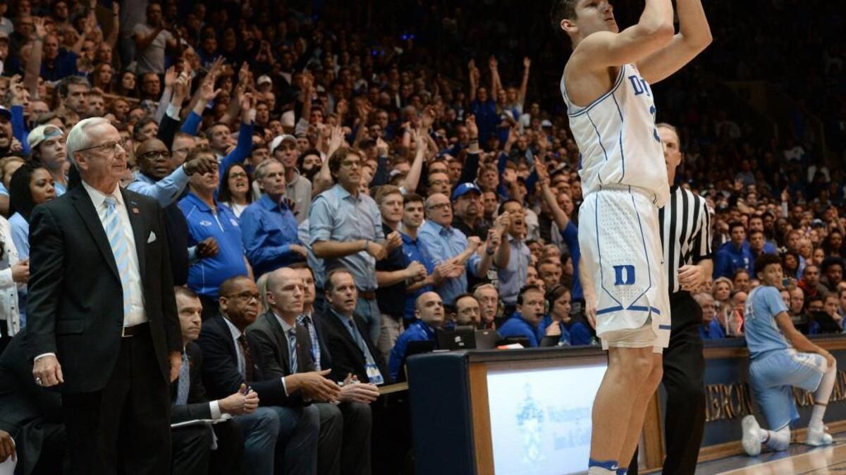 UNC coach Roy Williams watches as Duke guard Grayson Allen (3) shoots a 3 in the Blue Devils’ 86-78 win over the Tar Heels on Feb. 9.