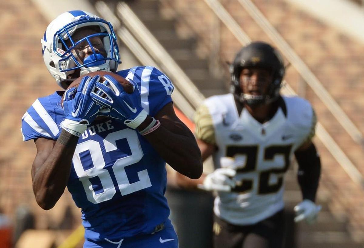 Duke senior wide receiver Chris Taylor, left, disagrees that athletes “don’t have time to do much more than pass” and keep up with the obligations of their sports.
