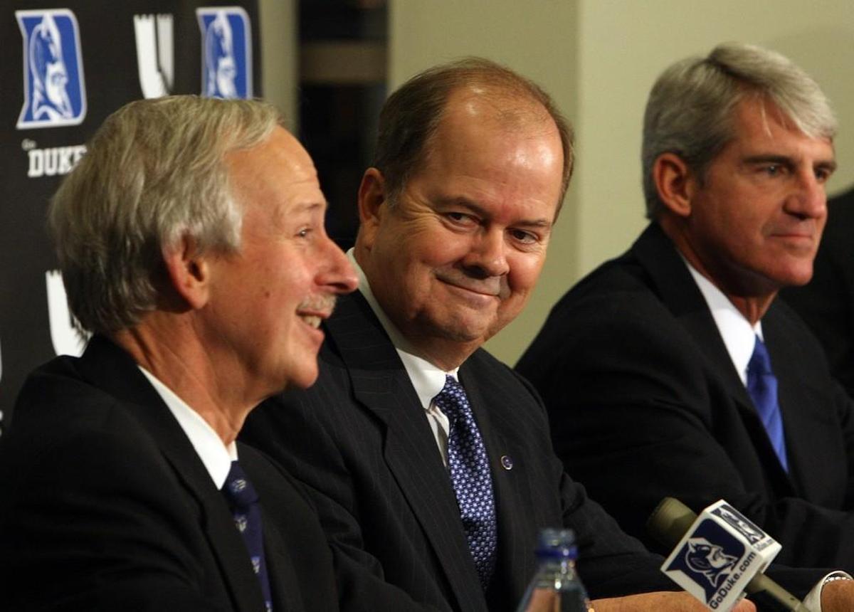 Duke President Richard Brodhead, left, introduces David Cutcliffe, middle, as the Blue Devils’ football coach on Dec. 15, 2007. At right is Joe Alleva.