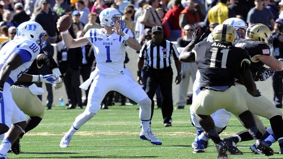 
Duke quarterback Thomas Sirk (1) throws a pass against Army during the first half in West Point, N.Y. Duke won the game 44-3. 
