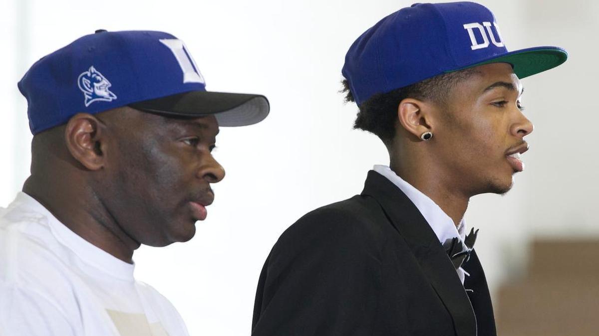 
Highly recruited basketball player Brandon Ingram, a senior at Kinston High School, announces that he will attend Duke University on Monday, April 27, 2015 at Kinston High School in Kinston, N.C. Ingram and his father Donald Ingram sport Duke caps following the announcement.
